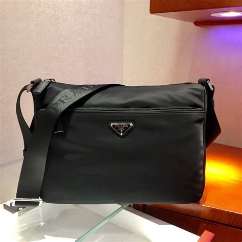 prada sling bag mens price|prada men's bag price.